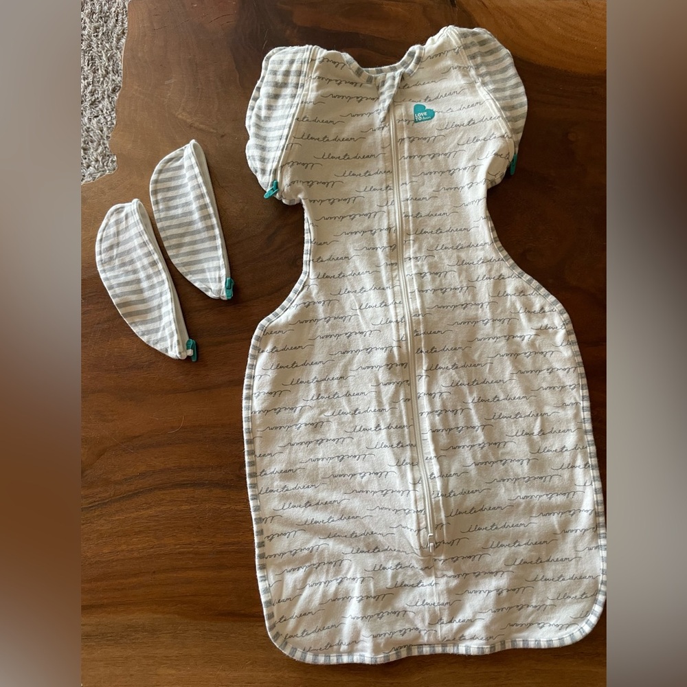 Love to Dream Cream Swaddle with Gray Stripes